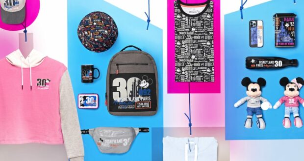 A colorful array of Disneyland Paris 30th anniversary merchandise, featuring limited-edition clothes, toys, bags, and accessories, all themed to celebrate three decades of magic at the park, beautifully displayed for fans and visitors.