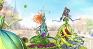 Three vibrant, ribbon-like floral sculptures brighten a fanciful garden in front of Sleeping Beauty Castle, celebrating the enchanting worlds and beloved characters that define 30 magical years at Disneyland Paris.