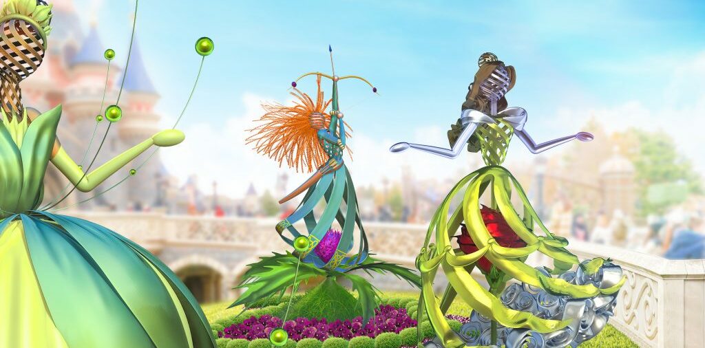 Three vibrant, ribbon-like floral sculptures brighten a fanciful garden in front of Sleeping Beauty Castle, celebrating the enchanting worlds and beloved characters that define 30 magical years at Disneyland Paris.