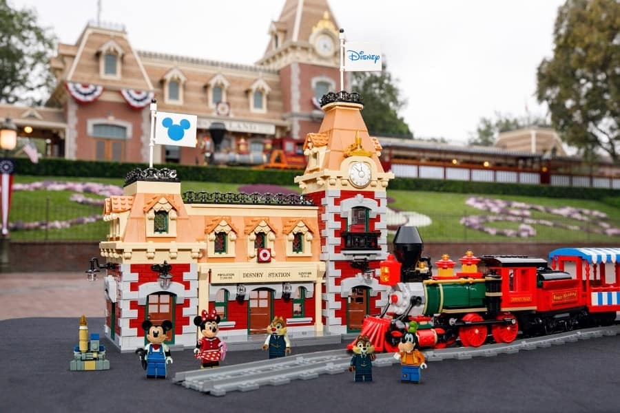 Step into the magic of National LEGO Day with an enchanting LEGO Disney train set, where beloved Disney characters and vibrant bricks bring Main Street Station at Disneyland to life for fans of all ages.
