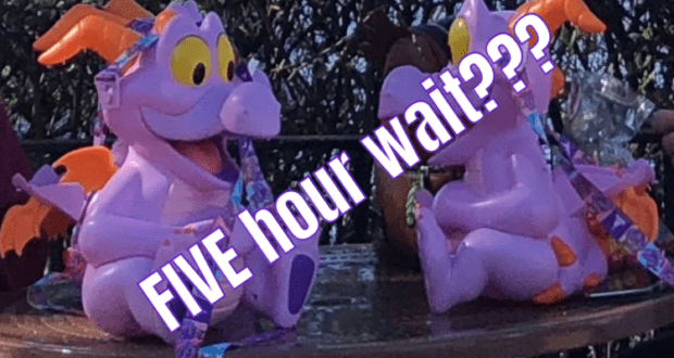 Figment popcorn buckets rest on an EPCOT table, with bold text overlay declaring, “FIVE hour wait???”—a must-see moment for Disney fans and collectors who know the hype surrounding exclusive park merchandise.