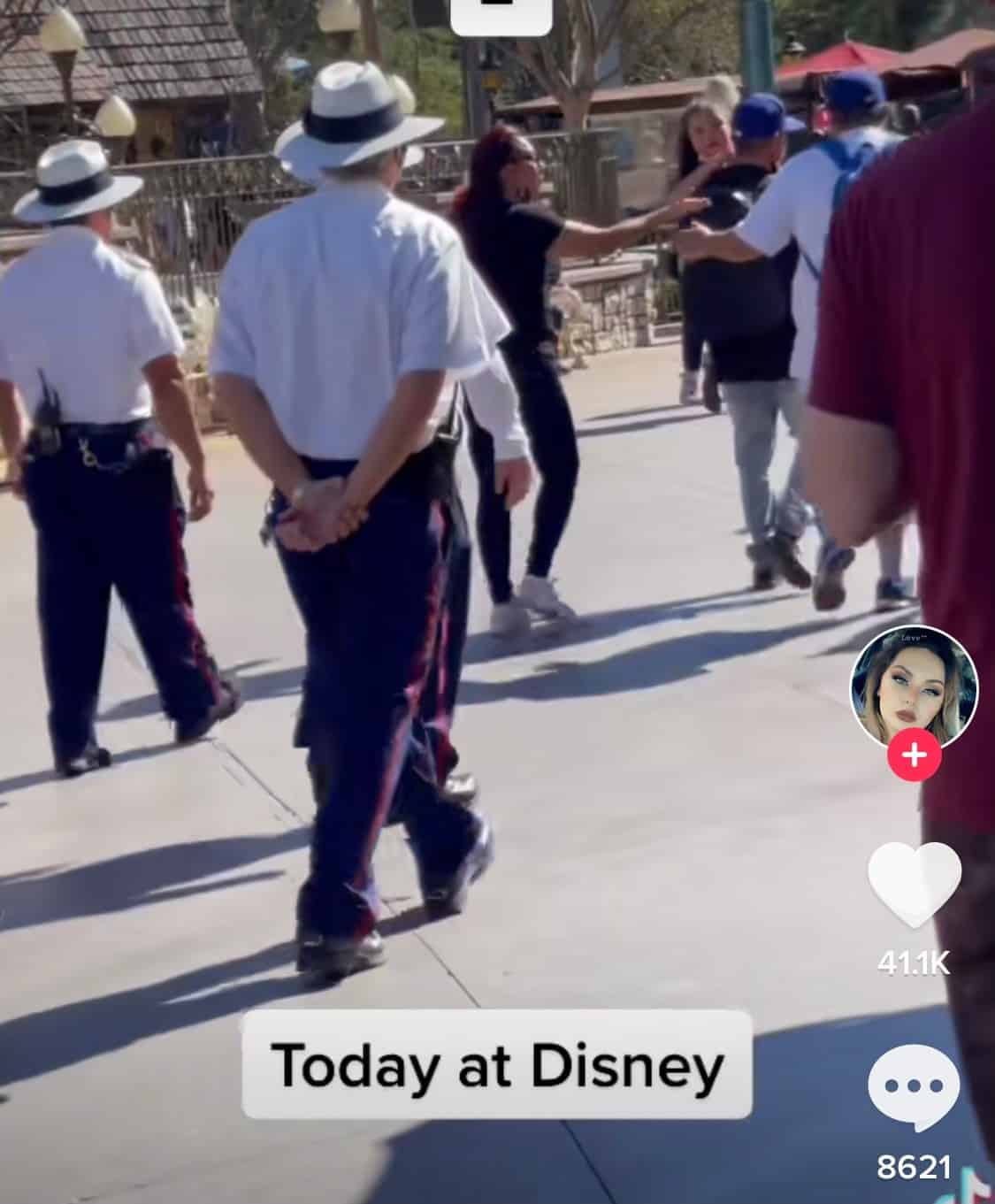 Guests and Disney Cast Members stroll through the park beneath the iconic “Today at Disney” banner—looks like tensions are high again with another heated argument unfolding right in the heart of the Happiest Place on Earth.