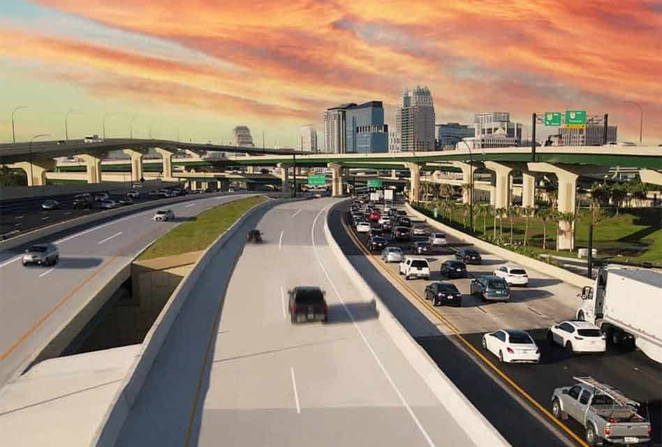 Traffic flowing on I-4’s multi-lane highway as it winds past Orlando’s iconic skyline and dazzling sunset, with city attractions visible in the distance, highlighting how theme park visitors can cruise the I-4 Express Lanes for FREE at select times.