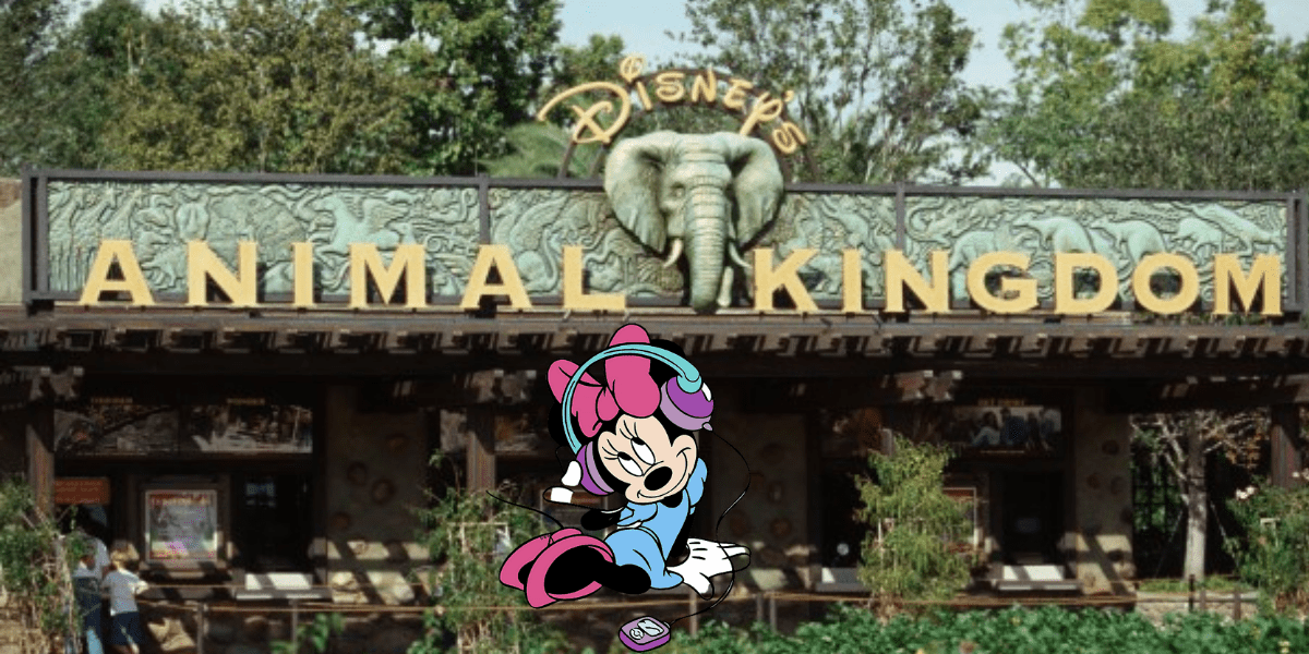 Mickey Mouse sports headphones at the entrance to Disney’s Animal Kingdom, set against a backdrop of lively music and signature Disney excitement filling the park atmosphere.