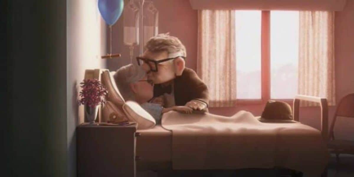An elderly man with glasses gently kisses his sleeping wife in a hospital room, reminiscent of sad Disney moments. A single blue balloon and a vase of flowers sit on the bedside table, as soft, warm light filters through the window curtains.