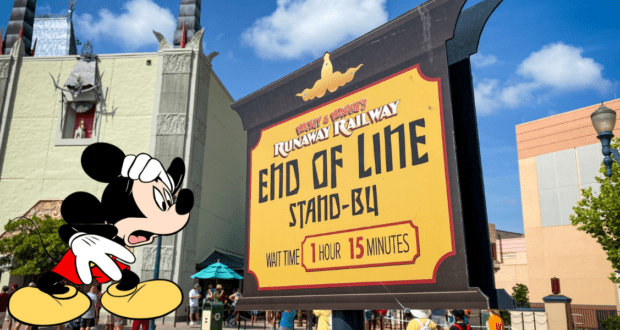 Mickey Mouse appears weary as he stands beside the “Runaway Railway End of Line” sign displaying a 75-minute wait, capturing the bustle and excitement that come with experiencing Disney World’s most popular attractions during peak times.