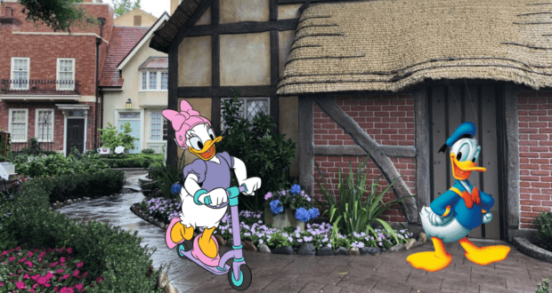 Daisy Duck explores Disney Parks on a Segway scooter near an enchanting cottage, possibly embarking on a special behind-the-scenes tour to uncover park secrets, while Donald Duck looks on from the doorway, enjoying her magical adventure.