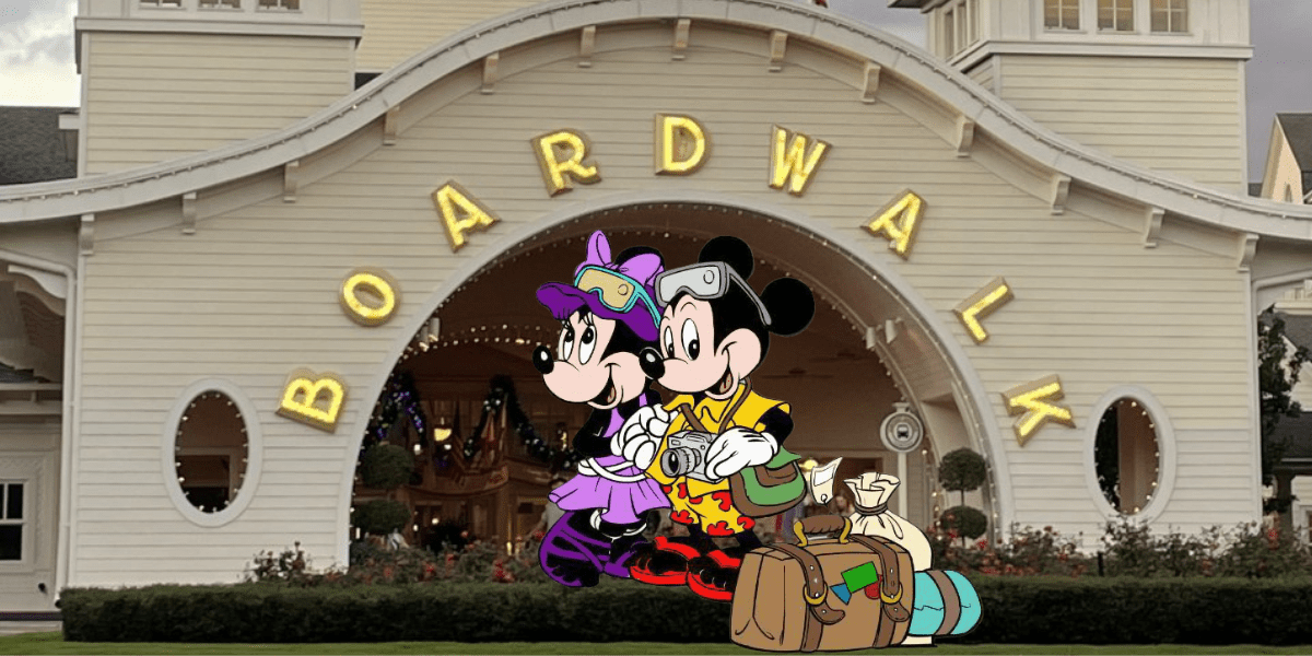 Mickey and Minnie Mouse pose with their suitcases in front of the BOARDWALK entrance, setting the scene for an exciting arrival at Disney’s BoardWalk Resort—an iconic Disney World experience that captures all the fun and anticipation of starting your magical vacation.