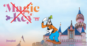 Goofy stands in front of a pastel-hued Disneyland castle, with "Disneyland Magic Key" boldly crossed out in red above the classic Disneyland logo.