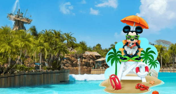 Mickey Mouse sports stylish sunglasses as he sits atop a lifeguard chair overlooking a lively wave pool, surrounded by swaying palm trees and an exciting water slide—ready to welcome guests as the ultimate Disney Lifeguard at one of Disney Resorts’ colorful poolside paradises.