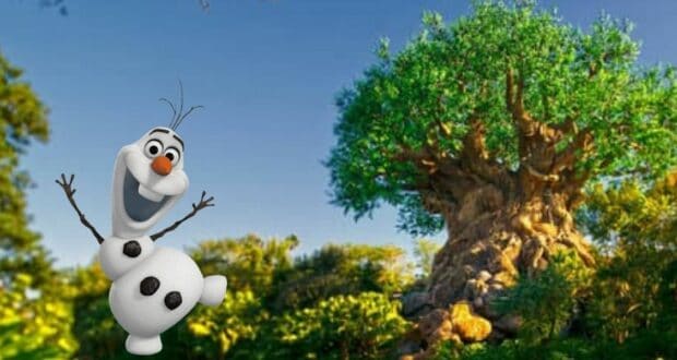 A cartoon snowman with a carrot nose and stick arms smiles widely, standing next to a large, intricately carved tree at Animal Kingdom under the blazing sun. The clear blue sky highlights the vibrant green leaves above, leaving you to wonder why it's so much hotter in this whimsical realm.
