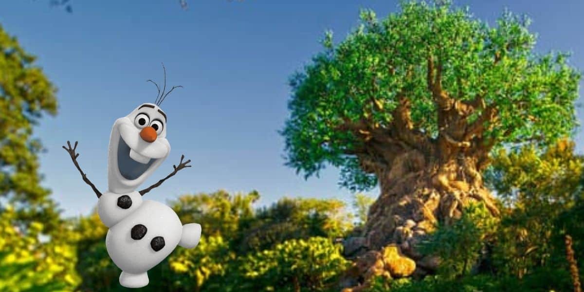A cartoon snowman with a carrot nose and stick arms smiles widely, standing next to a large, intricately carved tree at Animal Kingdom under the blazing sun. The clear blue sky highlights the vibrant green leaves above, leaving you to wonder why it's so much hotter in this whimsical realm.