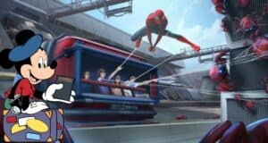 Mickey Mouse shows off a passport as Spider-Man swings past excited guests on a high-tech ride with robot spiders at Avengers Campus, Disneyland Paris.