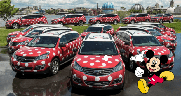 Minnie Vans—red vehicles decorated with white polka dots, iconic mouse ears on top, and a cheerful Mickey Mouse illustration on the side—bring Disney magic to life as they whisk guests around the parks in true whimsical style.
