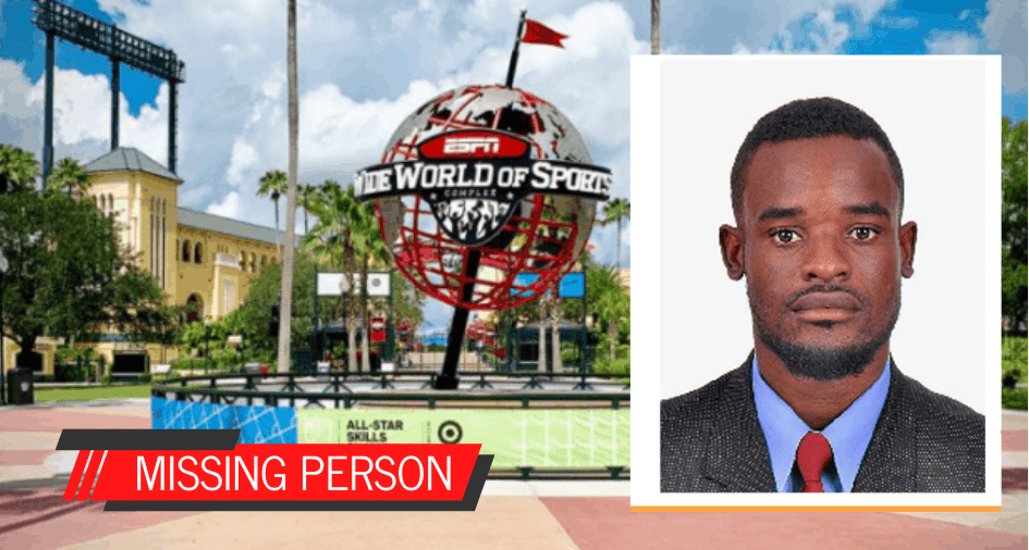 A "Missing Person" alert featuring a man's photo appears against the entrance of a major sports arena, spotlighting the urgent disappearance of Haitian Special Olympics Delegates during an international athletic event.