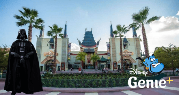 Darth Vader stands in front of the theater at Disney’s Hollywood Studios, with the Star Wars Launch Bay behind him and the Disney Genie+ logo displayed in the bottom right corner.