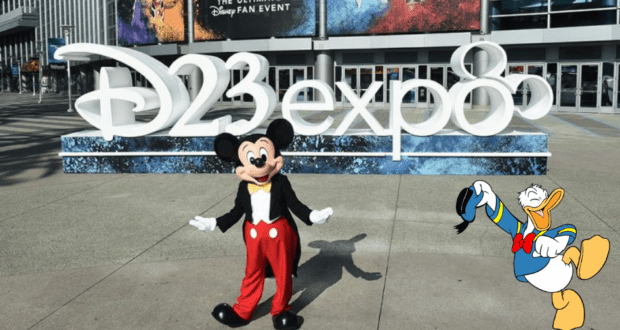 Mickey Mouse greets fans in front of the vibrant D23 Expo sign, while Donald Duck appears alongside him, bringing Disney magic and excitement to this special event for theme park and entertainment lovers.