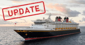 A Disney Cruise Line ship sailing at sea with a bold red "UPDATE" stamped across the top, signaling important news for Disney fans and cruise enthusiasts.