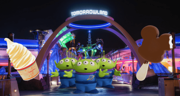 Tomorrowland at Magic Kingdom comes alive at night, featuring whimsical displays of iconic Disney snacks like Dole Whip alongside the playful trio of Toy Story aliens.