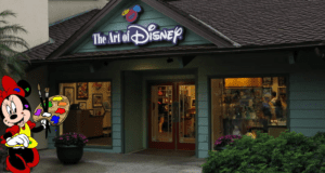 Step into the magical entrance of The Art of Disney at Disney Springs, where the storefront sparkles with welcoming lights and lush greenery frames the doorway. Greeted by Minnie Mouse holding art supplies, fans are immersed in an enchanting atmosphere that beautifully blends Disney charm with the artistry of Thomas Kinkade Studios.