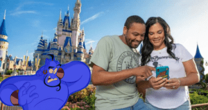 Guests smile at their phone in front of Cinderella Castle, with the Disney Genie+ character appearing beside them.