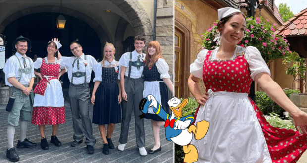 Disney Cultural Representatives dressed in vibrant traditional German outfits gather together, with Donald Duck joining the celebration up front.