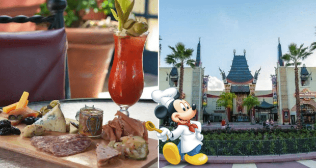 Charcuterie and a refreshing drink set on a table at the Hollywood Brown Derby Lounge, with Mickey Mouse in his chef hat greeting guests near the iconic theme park entrance lined with palm trees.