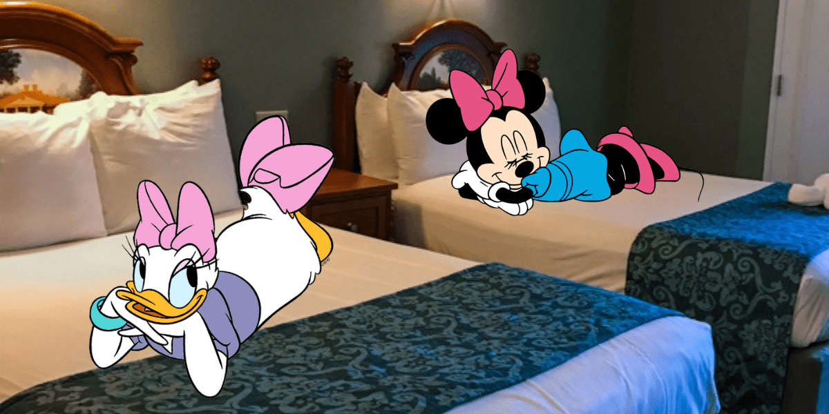 Daisy Duck and Minnie Mouse relax on separate beds inside a Disney Resort hotel room, smiling cheerfully with their heads resting on their arms, capturing the magical comfort of a Disney vacation.
