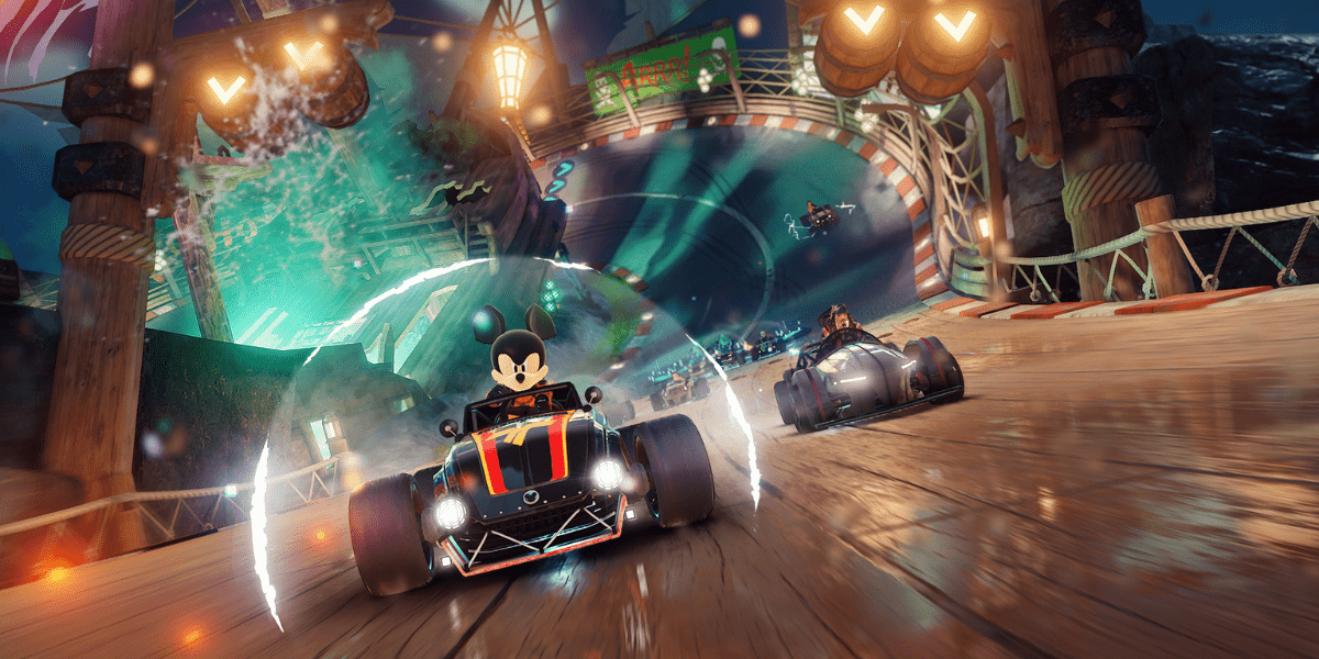 Mickey Mouse speeds along a dazzling, illuminated race track in Disney Speedstorm, thrilling fans as he competes closely with another racer for the finish line.