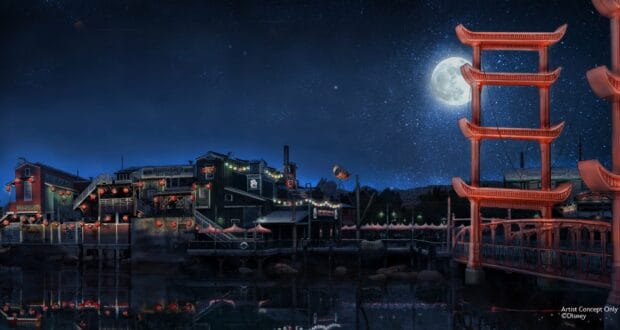 The San Fransokyo waterfront dazzles at night with glowing lanterns, iconic red torii gates, and a luminous full moon above the sparkling bay, capturing the lively spirit of an immersive theme park experience.