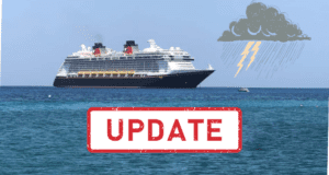 The Disney Fantasy, one of Disney Cruise Line’s iconic ships, sails across stormy seas under a darkening sky, while bold red "UPDATE" text signals an important announcement for fans as Hurricane Fiona draws near.