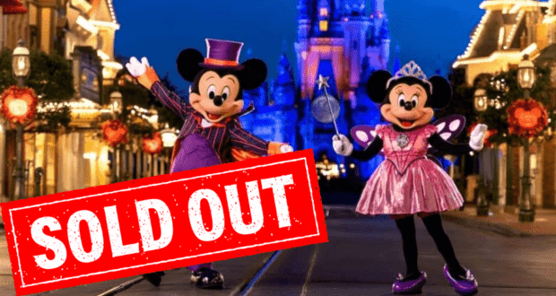 Mickey and Minnie dressed in festive costumes at Disney World, with a bold "SOLD OUT" banner signaling the huge popularity of Mickey's Not-So-Scary Halloween Party.