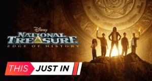 The adventurous cast of National Treasure: Edge of History stands together on an illuminated rocky ledge, with the show’s bold logo displayed beside them, evoking the excitement and intrigue fans love from the franchise—like unveiling a thrilling new attraction at a top entertainment destination.