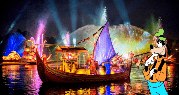 The Rivers of Light nighttime spectacular dazzles with vibrant fireworks, dancing water fountains, and a lively Disney character—Goofy—joining the celebration on the right.