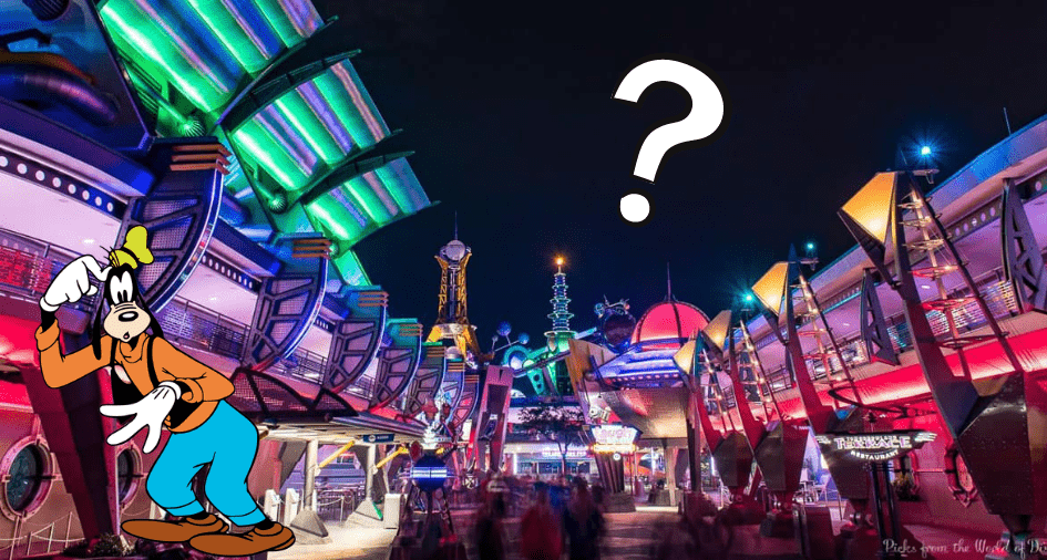Goofy puzzling over a tricky moment in Tomorrowland at night, surrounded by vibrant futuristic lights and architecture, with a playful question mark floating above his head.