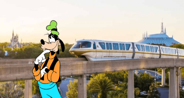 Goofy poses in front of the iconic Walt Disney World monorail, with Cinderella’s Castle and Space Mountain creating a magical backdrop.