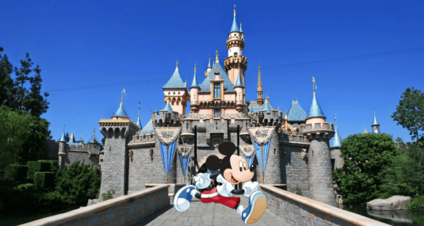 Mickey Mouse dashes in front of Disneyland’s enchanting fairytale castle, its blue spires shining under a vibrant sky, bringing the runDisney adventure to life with the irresistible magic and energy fans love about Disney parks.