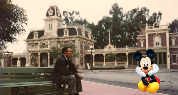 Mickey Mouse sits on a bench outside a charming vintage building, capturing the whimsical atmosphere guests experience near the Walt Disney statue at Disney World.