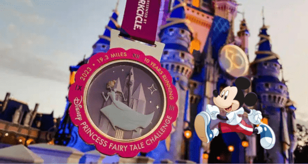 The Disney Princess Fairy Tale Challenge medal displayed in front of Cinderella Castle at Magic Kingdom, featuring an image of Mickey Mouse running, highlights the excitement and celebration of the Disney Princess Half Marathon event.