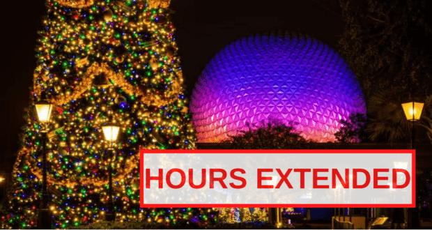 The iconic Disney Christmas tree sparkles beside a glowing dome under the night sky, while a bold red “HOURS EXTENDED” sign welcomes guests to more magical moments during Walt Disney World’s festive holiday season.