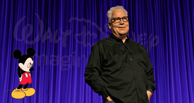 A Disney stage lights up with a vibrant Mickey Mouse illustration as legendary Imagineer Bob Weis is honored, standing beneath the iconic Disney logo on a purple curtain backdrop, celebrating creativity and magic in front of an enthusiastic theme park crowd.