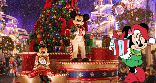 Mickey and Minnie, dressed in festive holiday attire, greet guests beside a sparkling Christmas tree at Disney Parks; Minnie holds a present as gentle snow falls, bringing the enchanting spirit of the Disney Christmas Countdown to life.