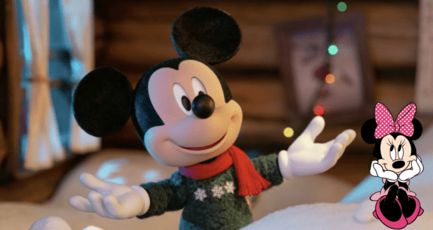 Mickey Mouse greets guests in a cozy sweater and bright red scarf inside a festive Disney World setting, while a delightful Minnie Mouse cartoon adds extra magic in the lower right corner.
