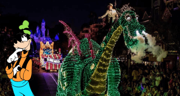 Goofy admires the dazzling, smoke-breathing dragon float as it glides down Main Street during the iconic Electrical Parade, while excited guests gather to experience the magical nighttime celebration.