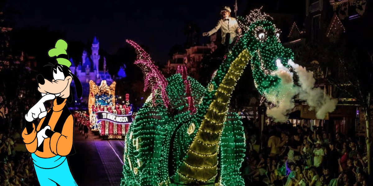 Goofy admires the dazzling, smoke-breathing dragon float as it glides down Main Street during the iconic Electrical Parade, while excited guests gather to experience the magical nighttime celebration.
