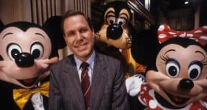 Michael Eisner with Disney characters