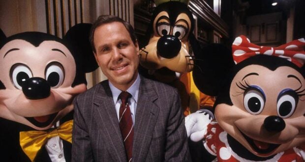 Michael Eisner with Disney characters