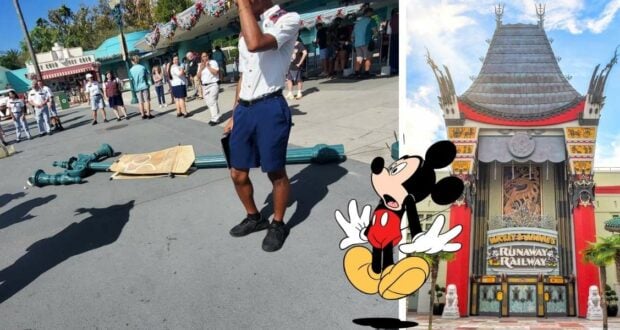A fallen lamppost at Disney’s Hollywood Studios, with cast members responding nearby, Mickey Mouse making an appearance, and the iconic Chinese Theatre in the background.