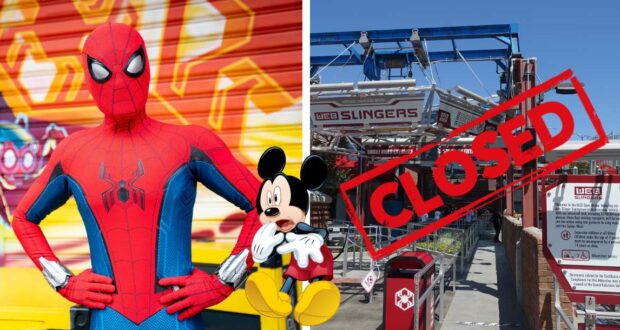Spider-Man and Mickey Mouse pose together beside the Disney Spider-Man WEB Slingers ride, currently closed with a prominent "CLOSED" sign at the park.