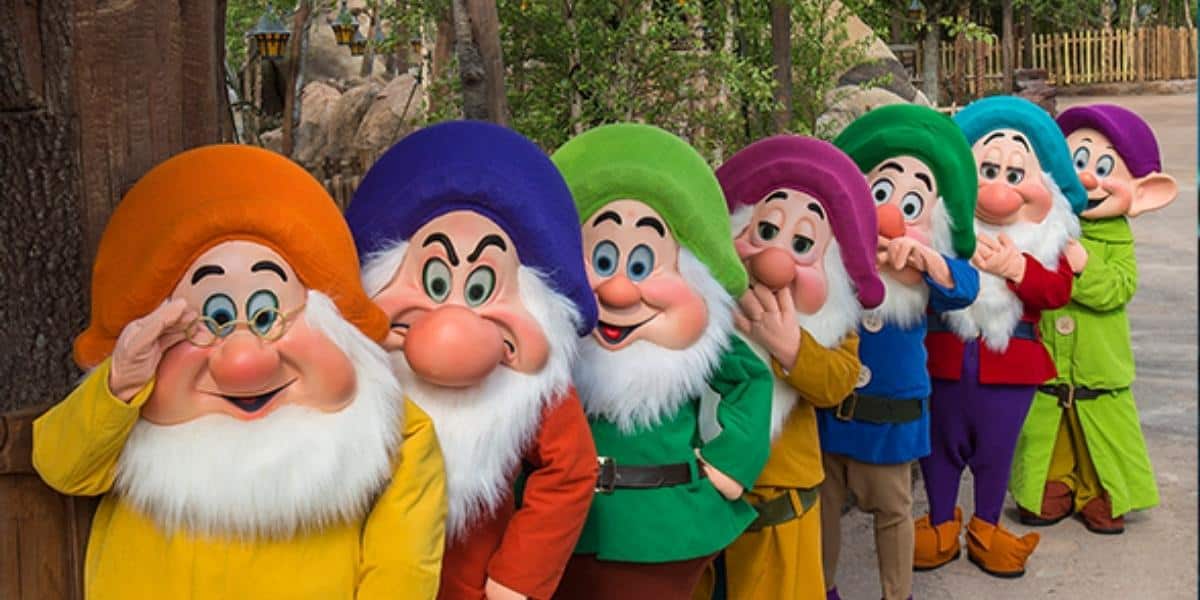 The Seven Dwarfs in front of Seven Dwarfs mine train wdw